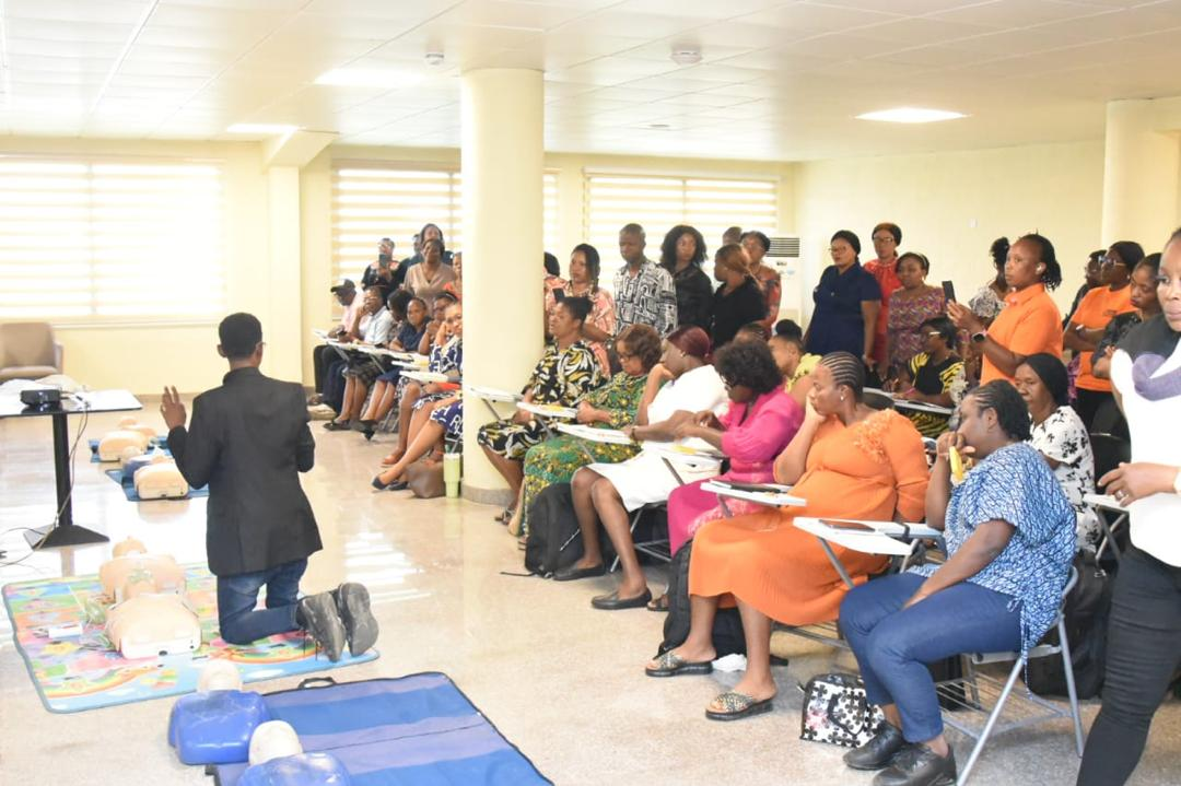 Auditorium of healthcare workers seated during a mission training session
